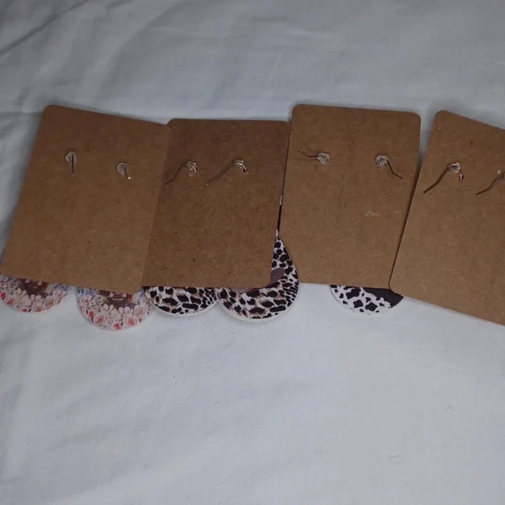 4 pair Cow dangle earrings